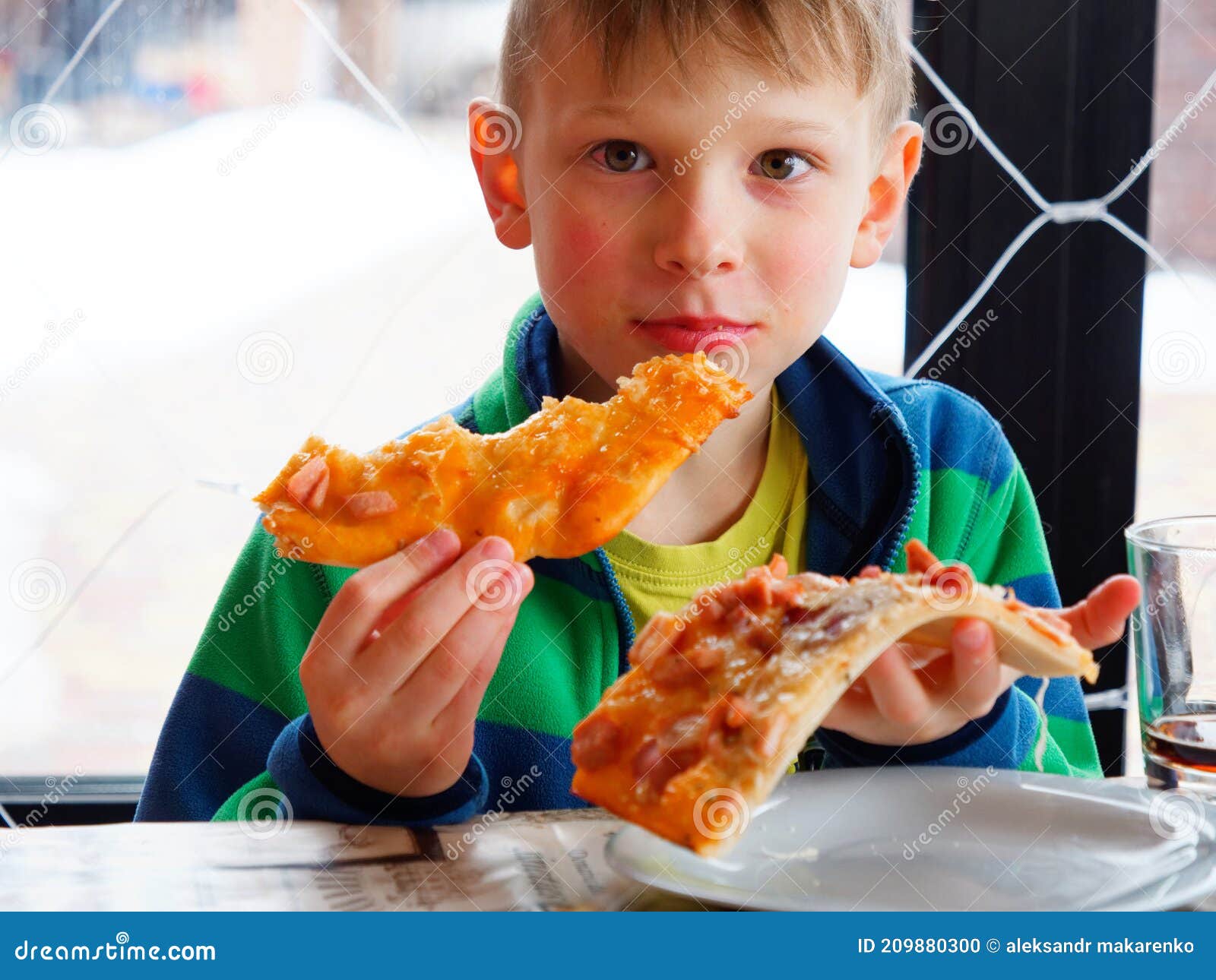 Portrait of a Boy Greedily Eating Pizza Stock Photo Image of meal