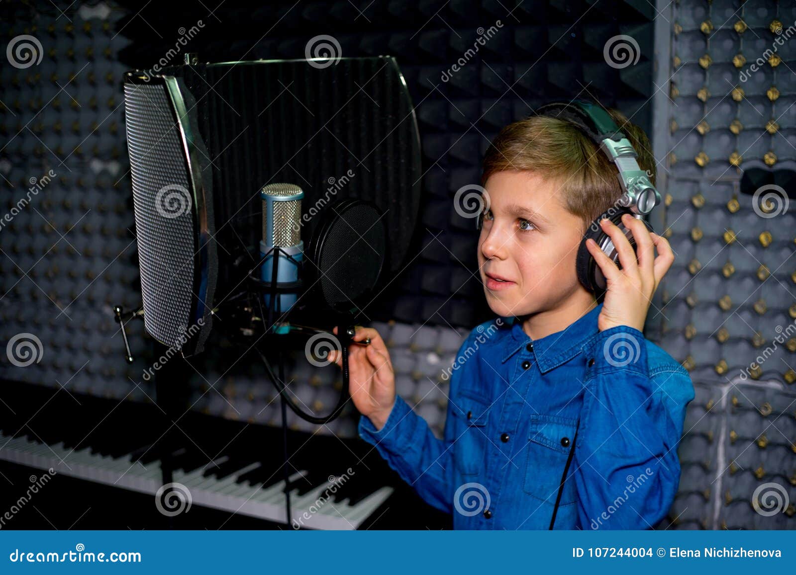 Boy in a recording studio stock photo. Image of electronic 107244004