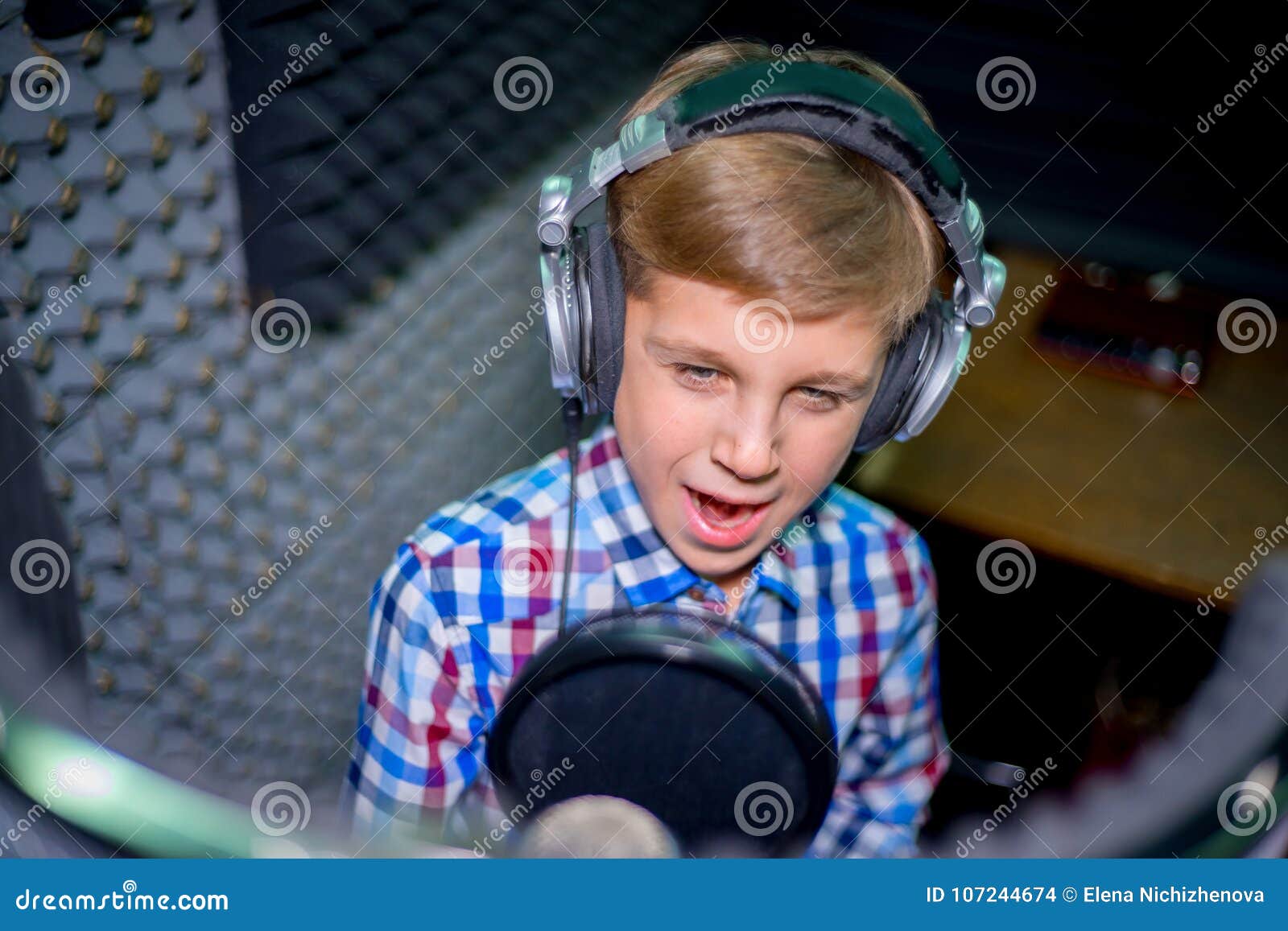 Boy in a recording studio stock photo. Image of balance 107244674