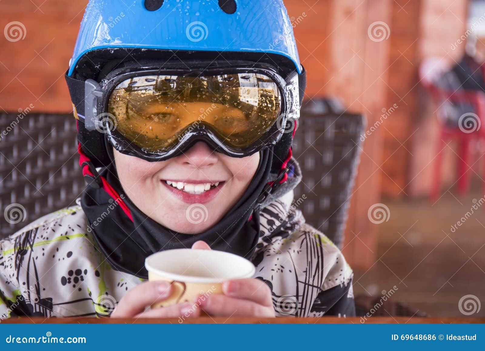 Portrait of a Boy in Ski Helmet and Protective Glasses Stock Photo