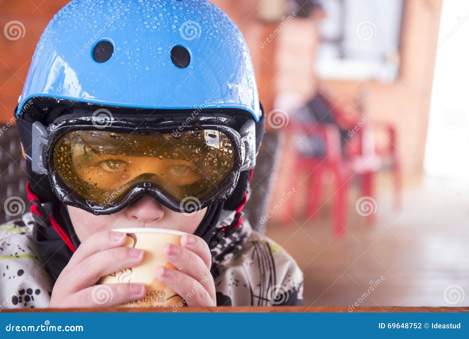 Portrait of a Boy in Ski Helmet and Protective Glasses Stock Photo