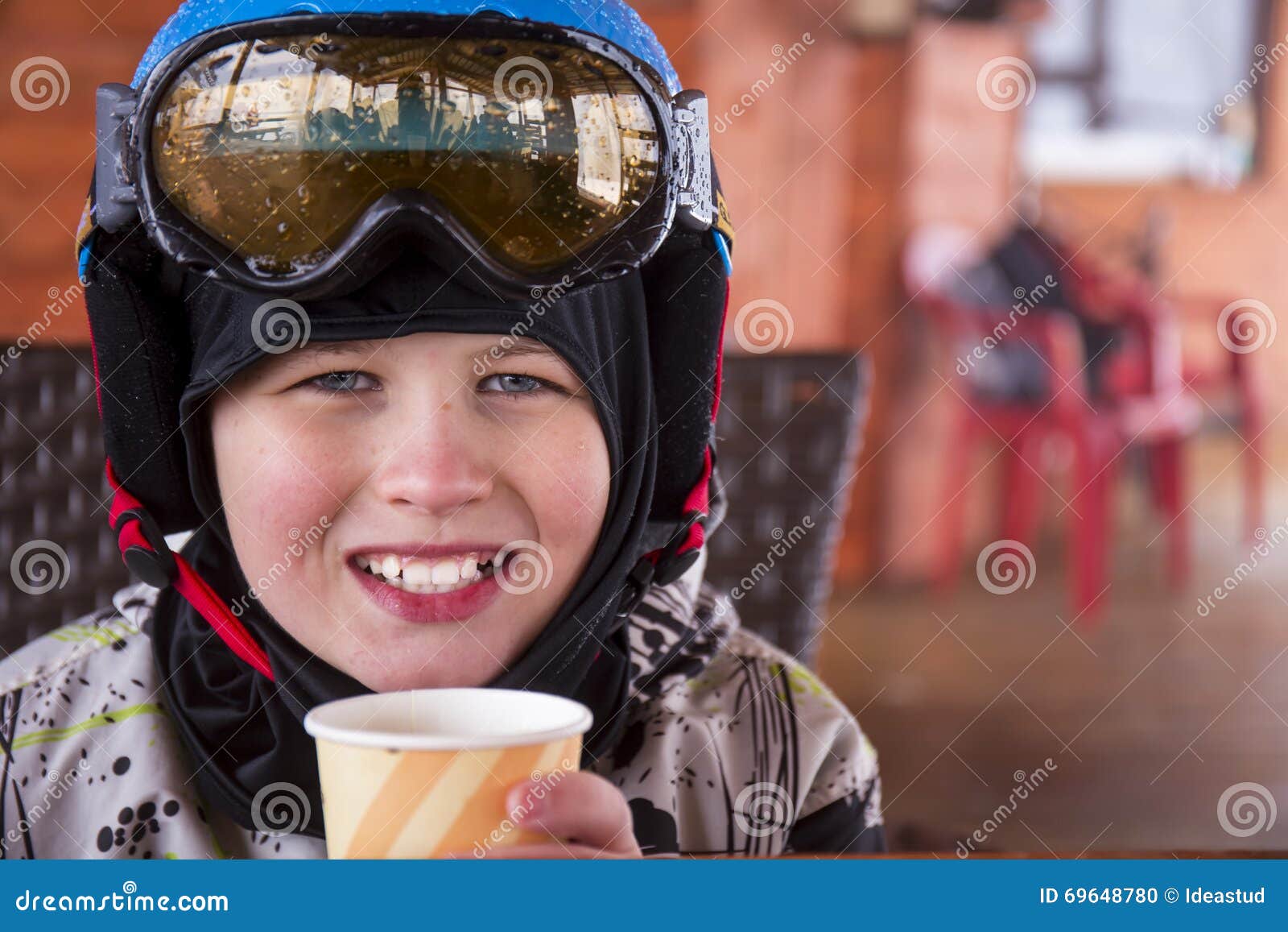 Portrait of a Boy in Ski Helmet and Protective Glasses Stock Photo
