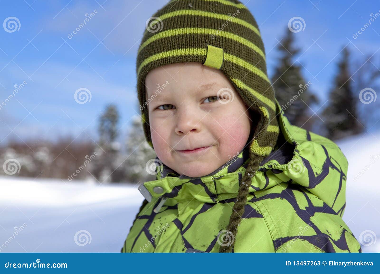 Boy In A Cold Winter Day Outdoors In Warm Clothes Stock Photo, Picture and  Royalty Free Image. Image 25442133.