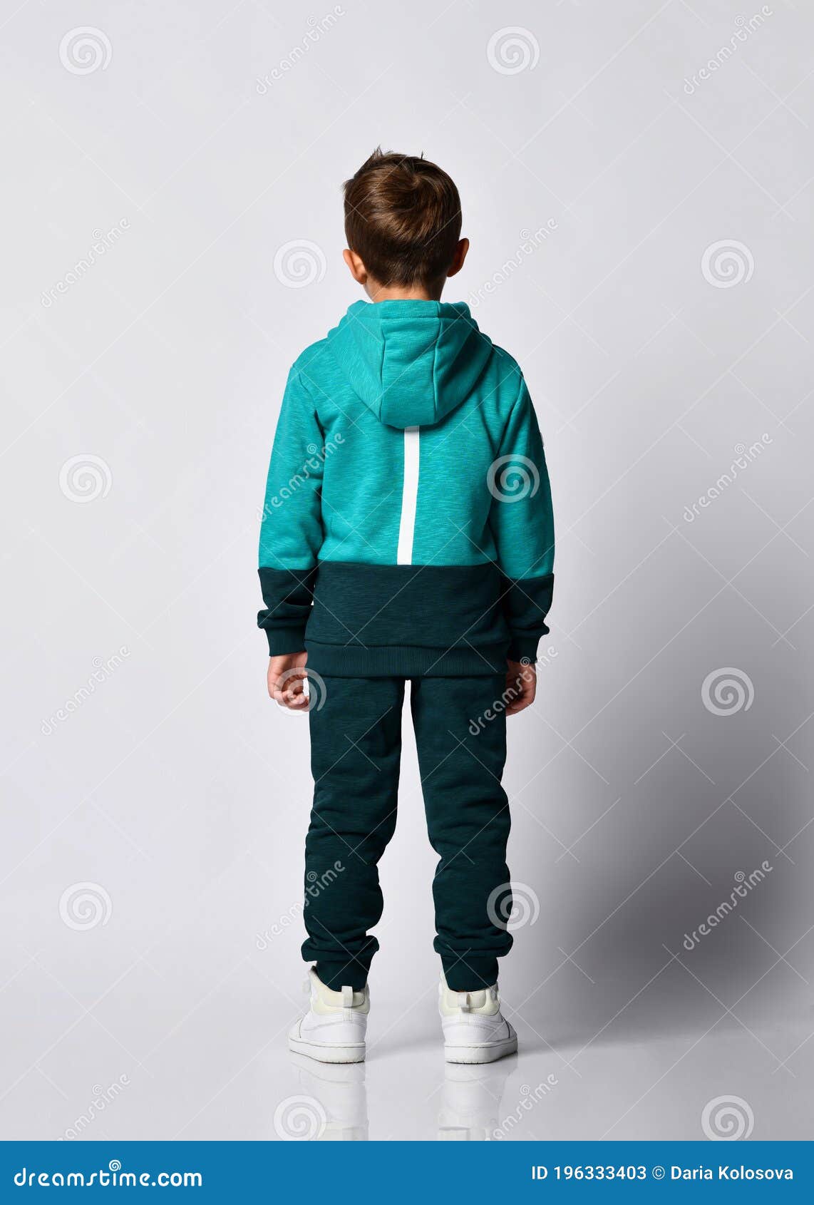 Portrait Boy in Warm Tracksuit, Sneakers Back View Stock Image - Image ...