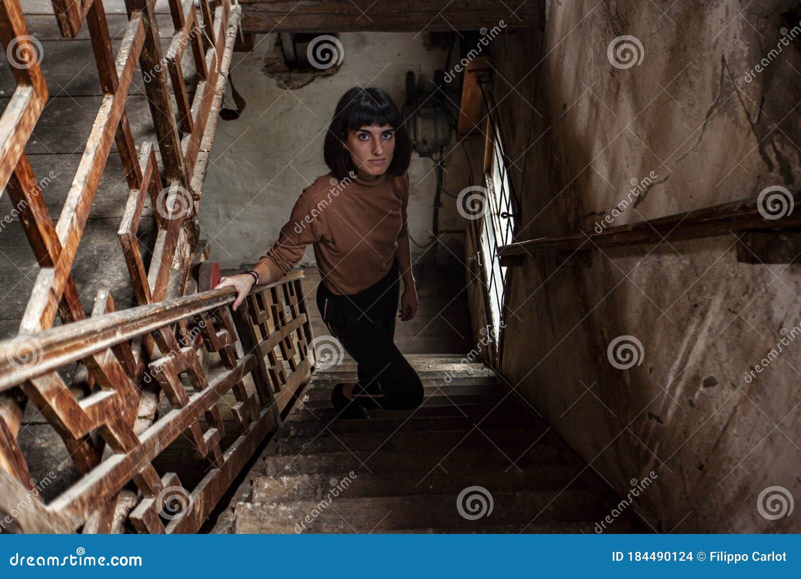 Portrait of a Brunette Girl in a Staircase of an Abandoned House 5 ...