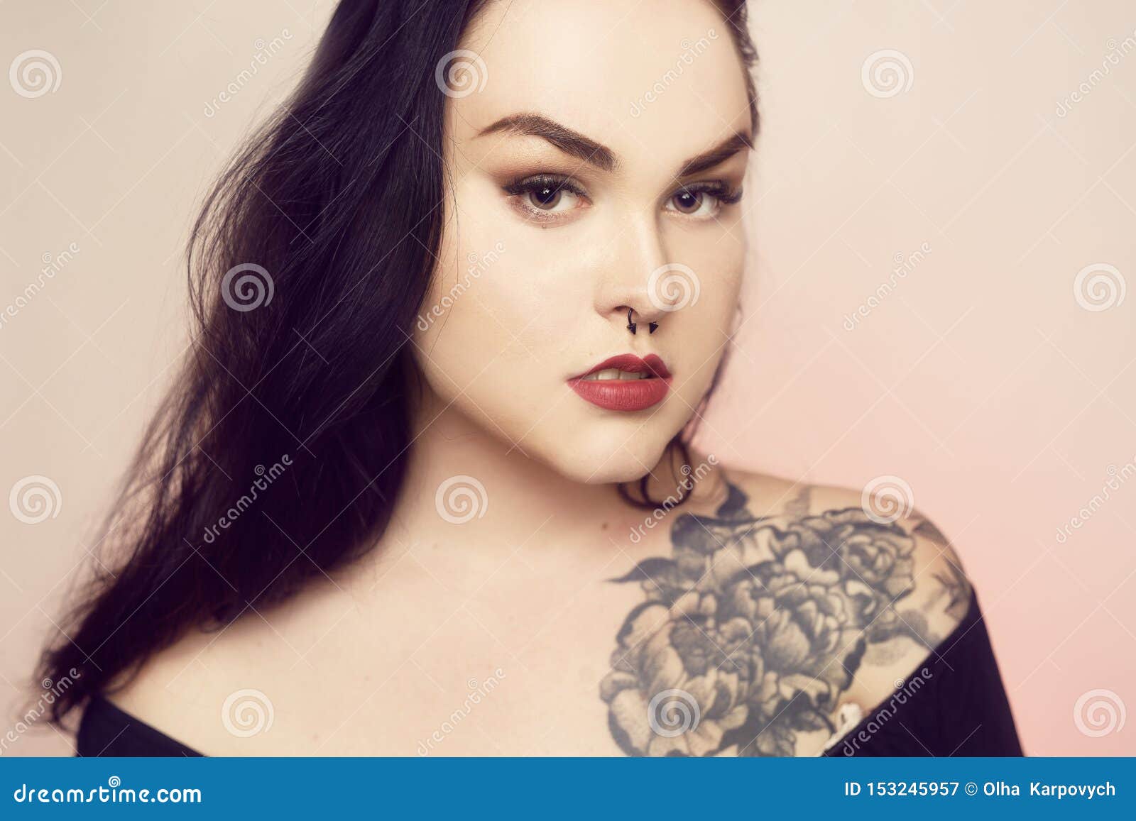 Portrait of a Brunette with a Pierced Nose. Beautiful Duvushka with a ...