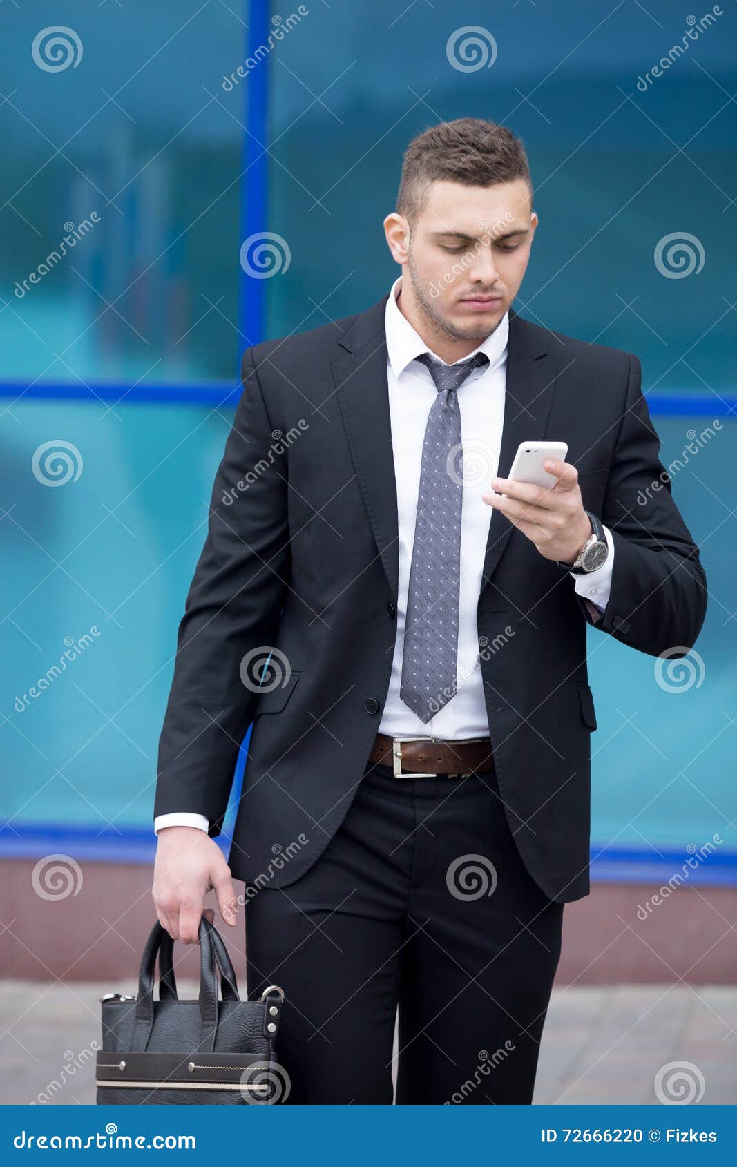 Portrait of Business Man Looking at Smartphone Screen with Focus Stock ...