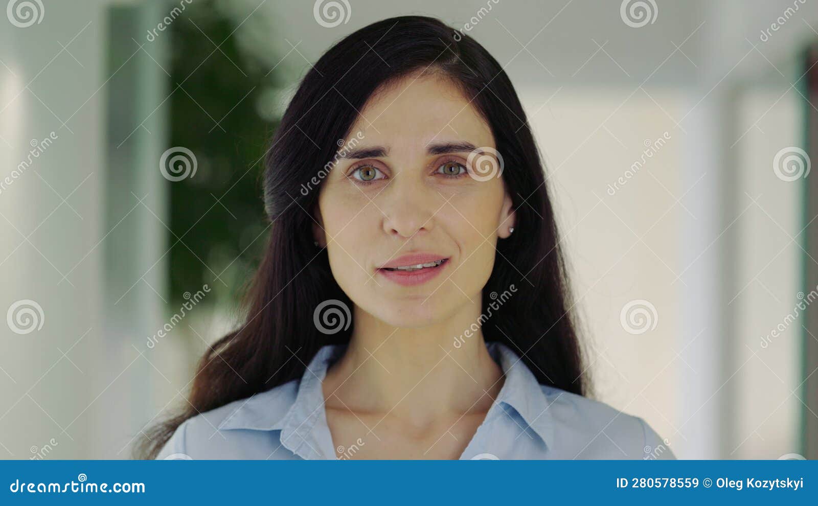 Portrait of Caucasian Attractive Lady Standing in Office Looking at ...