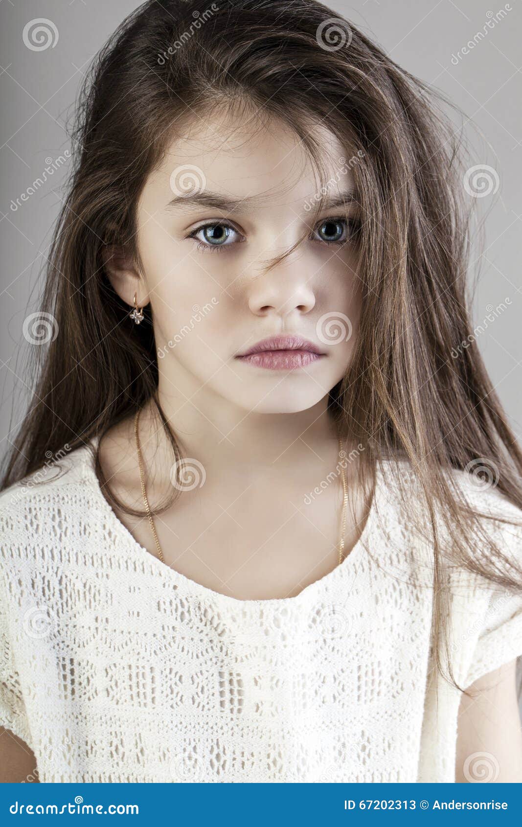 Portrait Of A Charming Brunette Little Girl Stock Im