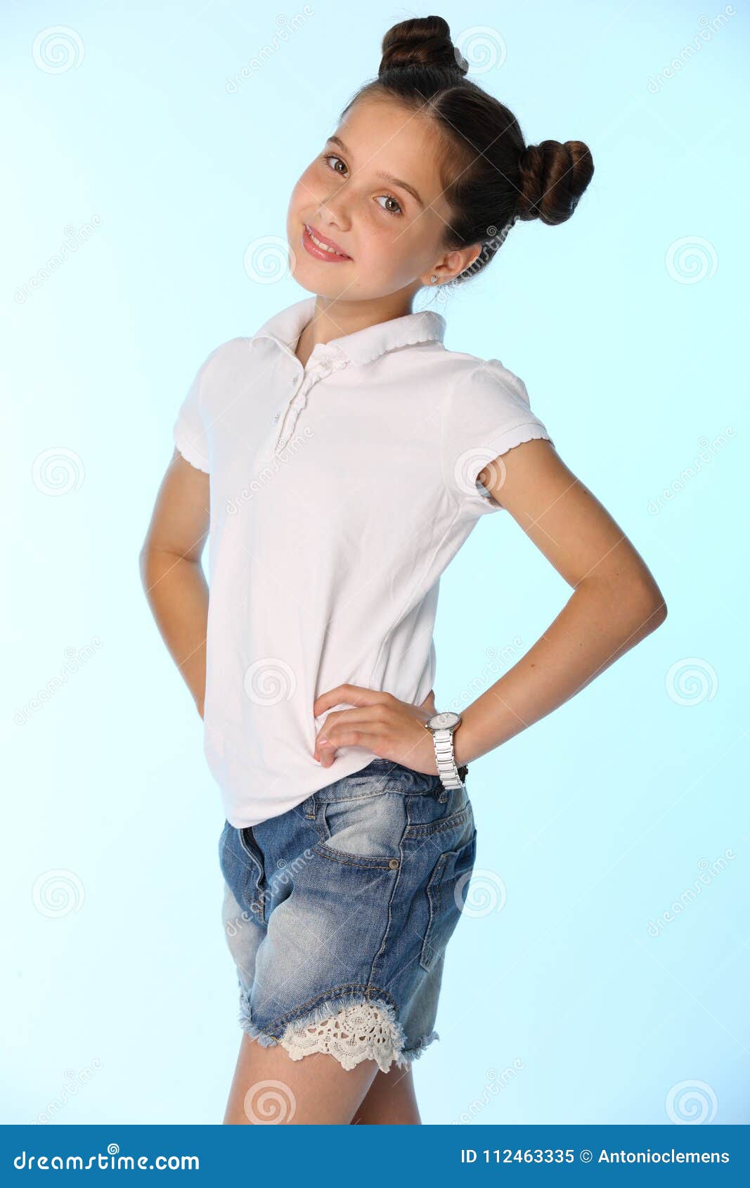 Portrait of a Little Girl 12 Years Old Smiling, she is in a Blue Denim  Shorts Stock Image - Image of hair, face: 112463335