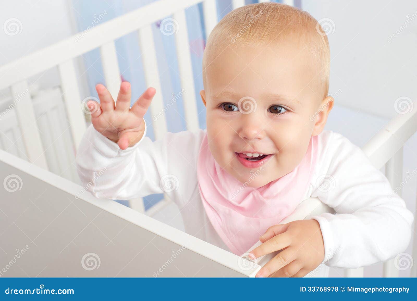 Portrait Of A Cheerful Baby Waving Hello Royalty Free Stock Photos Image 33768978
