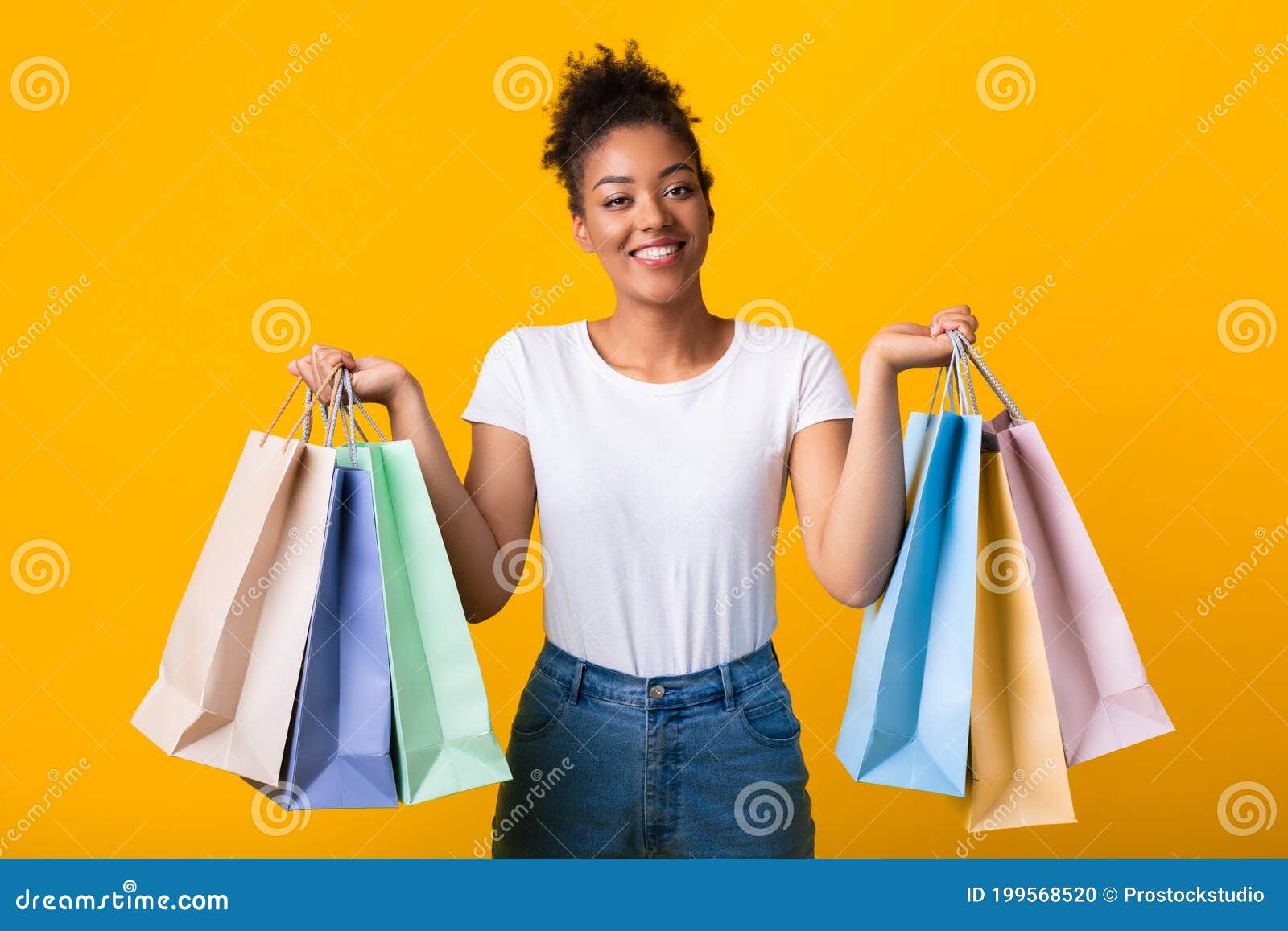 Portrait of Cheerful Black Woman Holding Shopping Bags Stock Photo ...