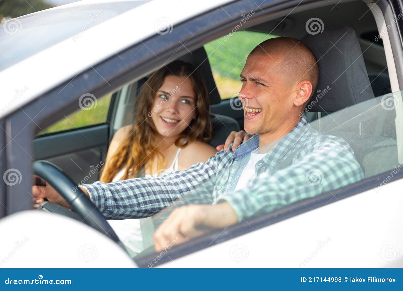 Girlfriend A Passenger Sitting Behind Female Motorcyclist On A Motorbike Cheerful Females