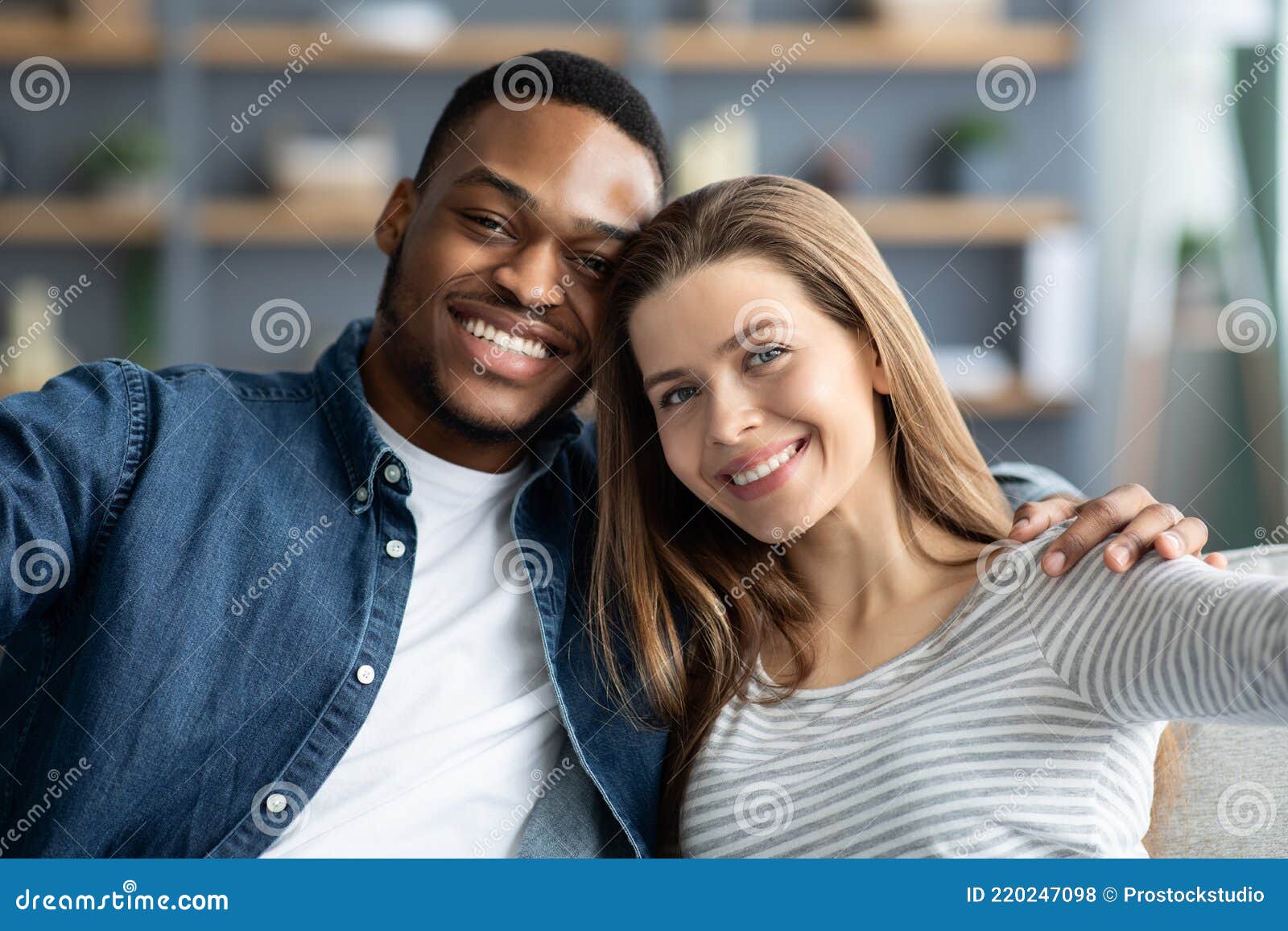 self shot interracial couple