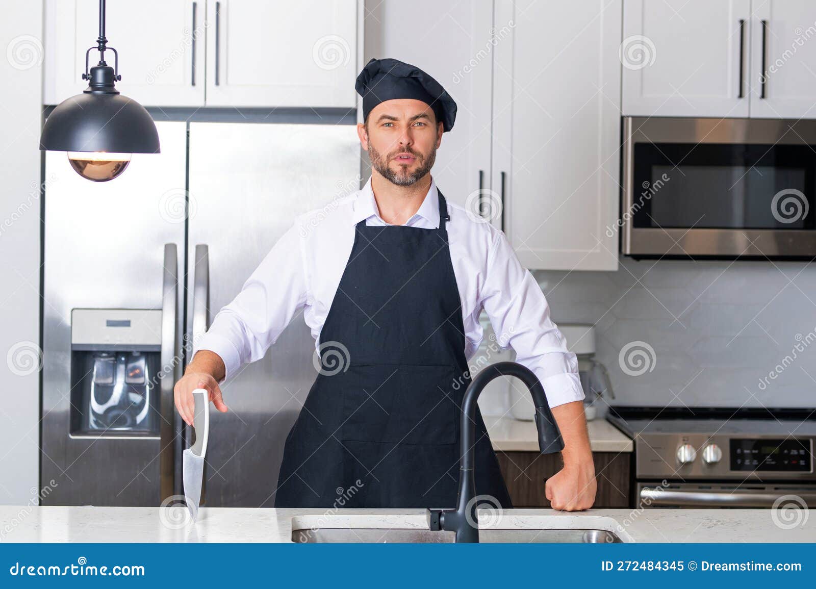 Portrait of Chef, Cooks or Baker. Man in Cook Hat and Chef Uniform