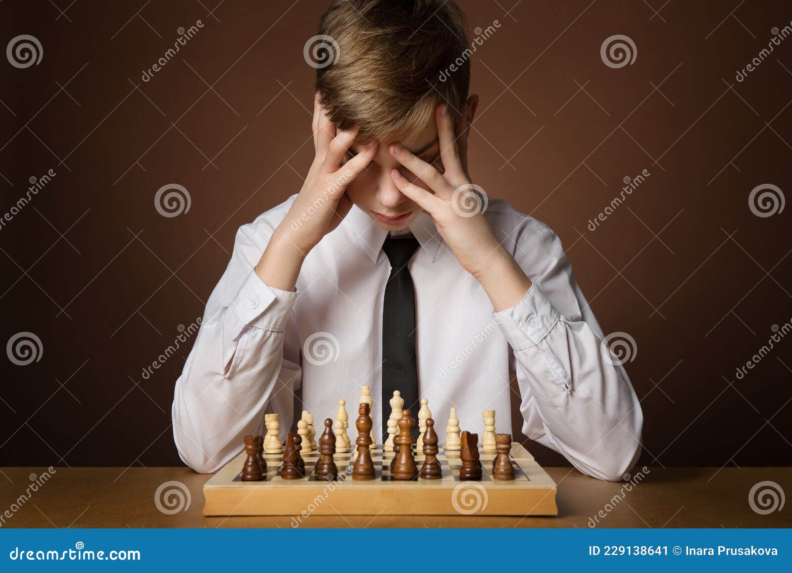 Male chess player with figures in the eyes, thinking process