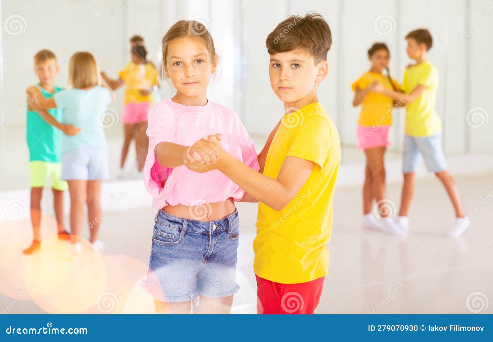 Portrait of Children Enjoying of Partner Dance in Class Stock Photo