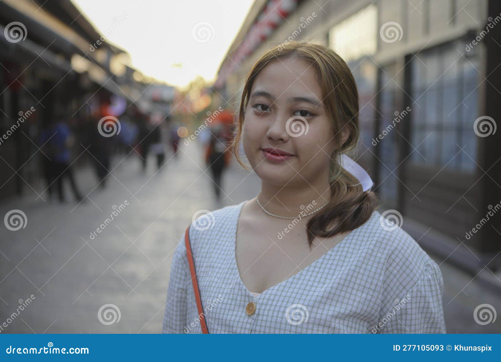 Portrait Of Chubby Asian Woman Standing Outdoor Against Japanese Building Style Stock Image