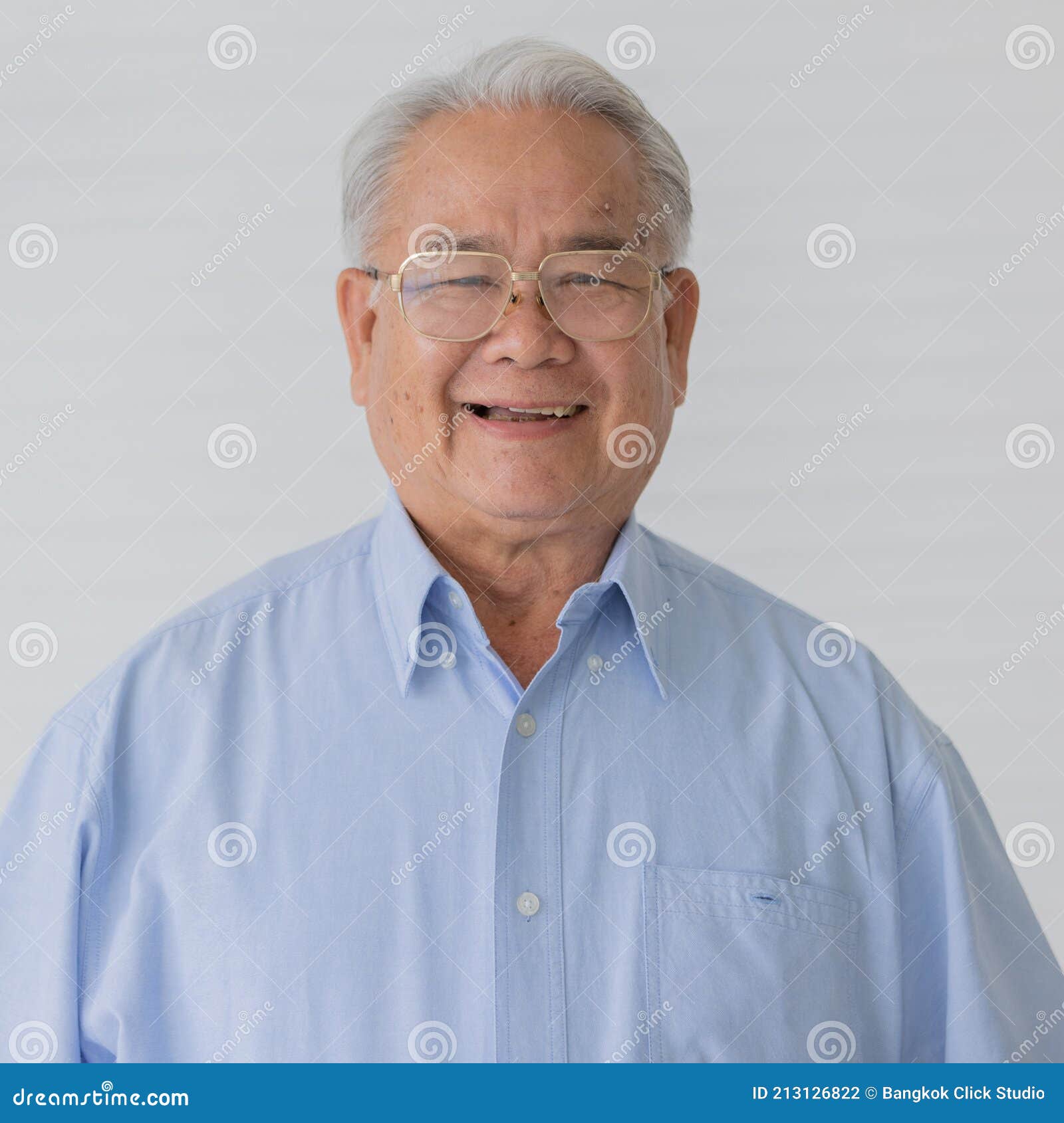 Portrait Close Up Shot Of Asian Old Fat Male Model With Short White And Gray Hair Wearing