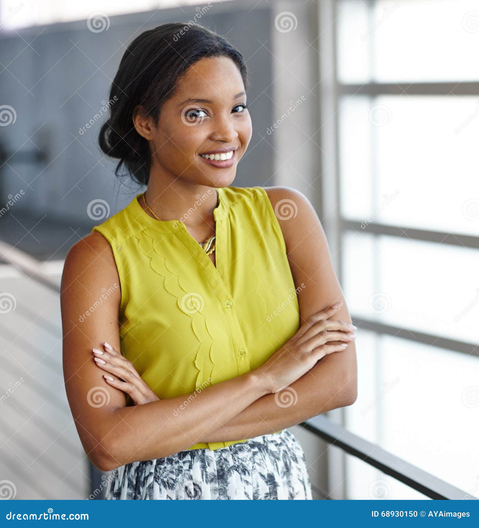 Portrait Of A Confident Black Businesswoman At Work In Her Glass Office ...