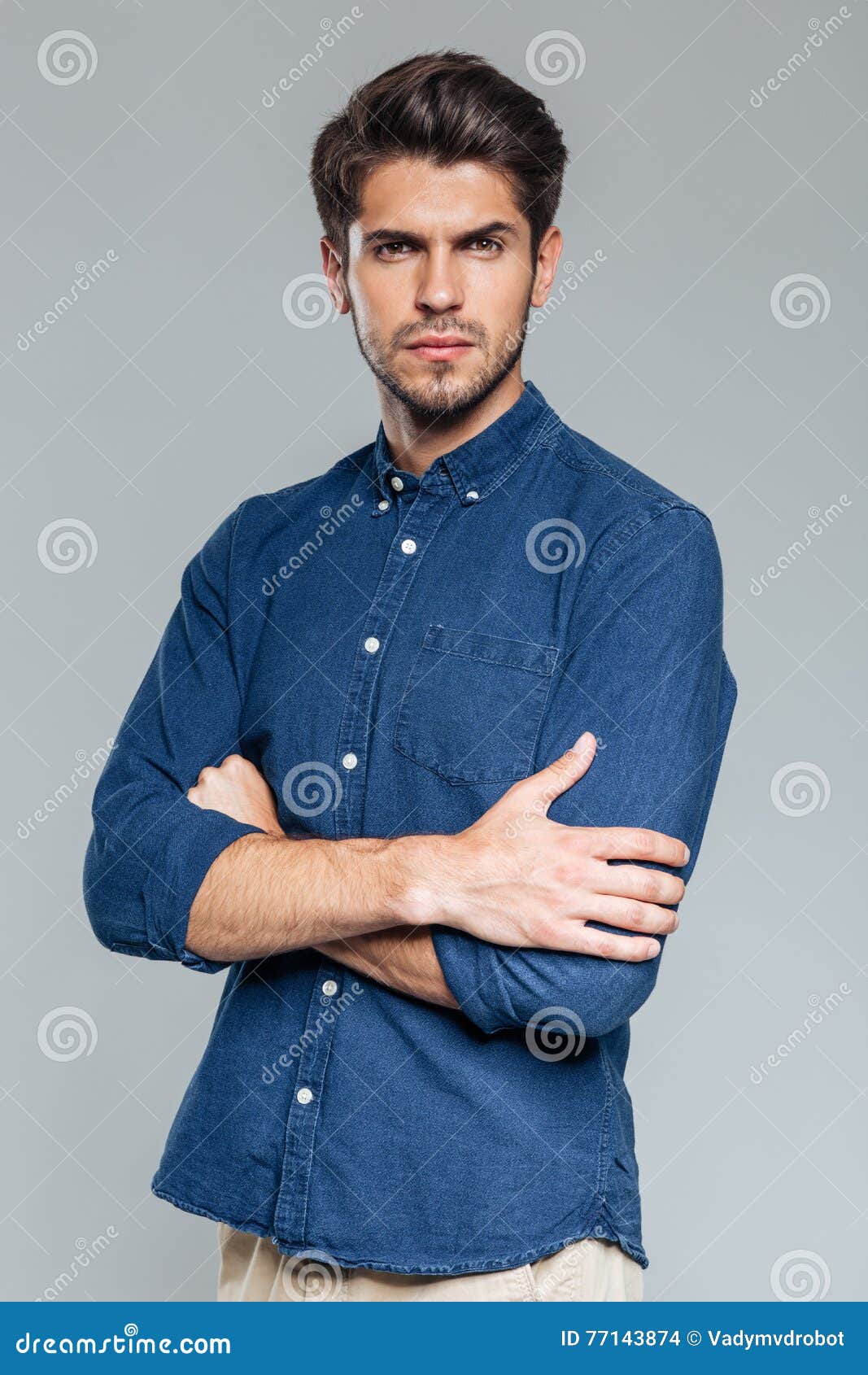 Portrait of a Confident Handsome Man Standing with Arms Folded Stock ...