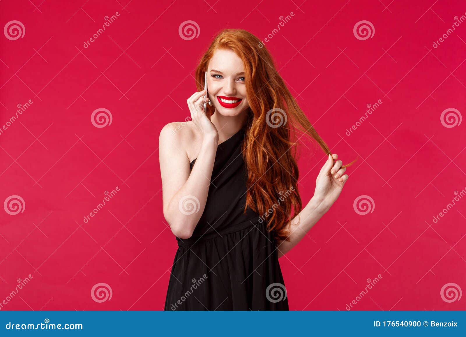 Portrait Of Coquettish Flirty Feminine Redhead Woman In Black Dress Giggle While Talking On 