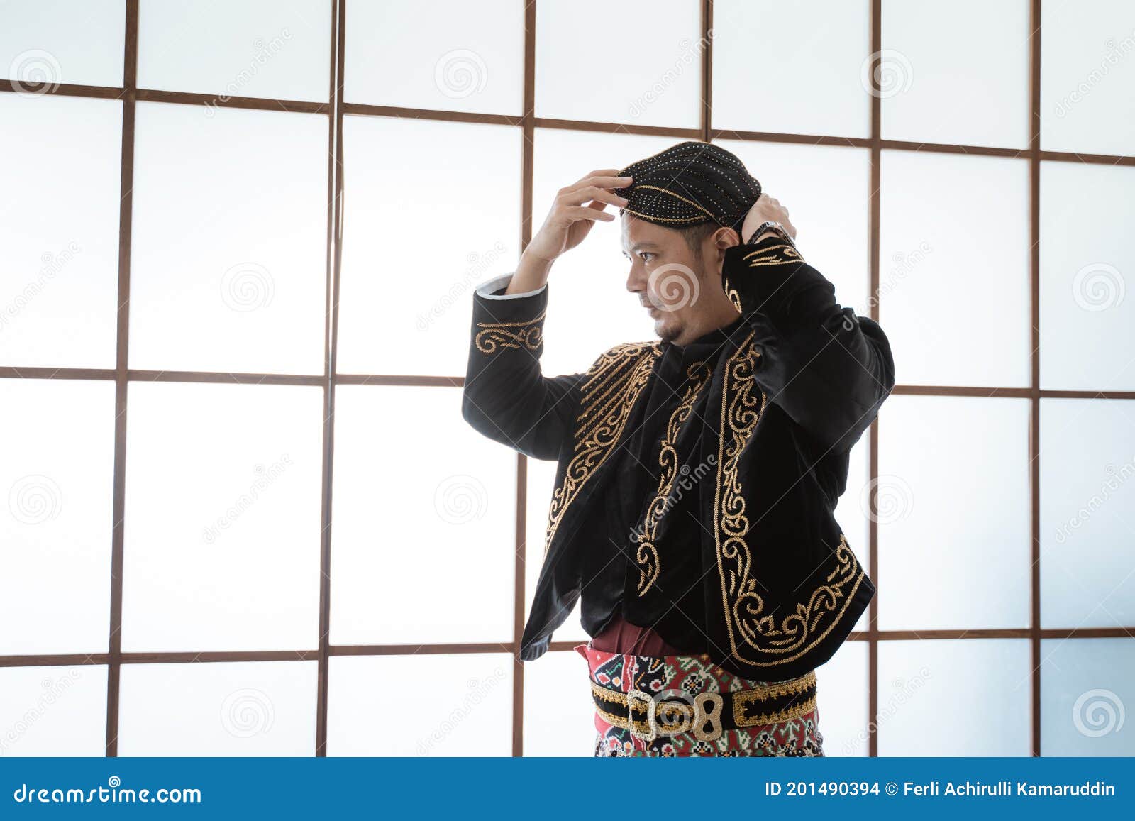 a portrait of a costume traditional javanese man.