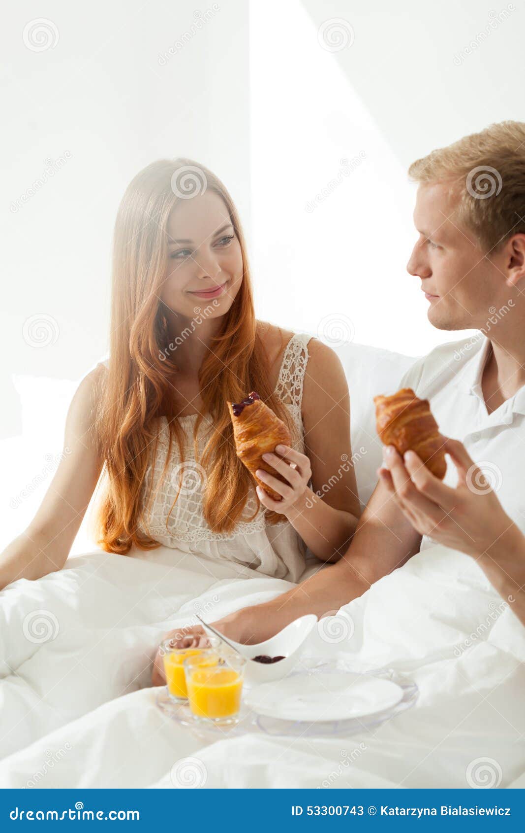 Portrait of Couple Eating in Bed Stock Image Image of comfortable