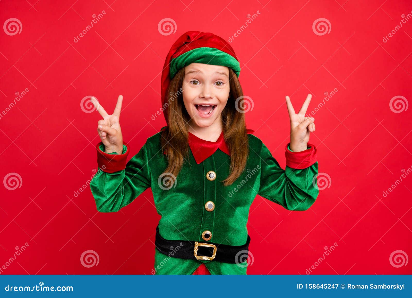 Portrait Of Crazy Elf Kid In Green Hat With Long Red Head