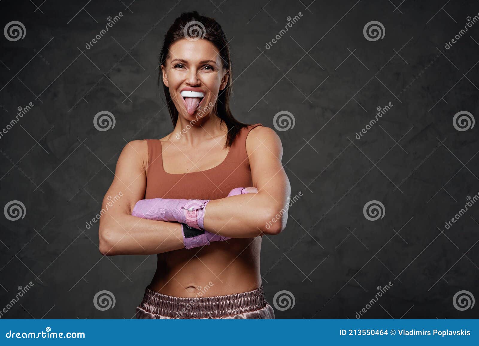 Crazy and Muscular Sportswoman with Crossed Arms Posing in Studio Stock  Photo - Image of kickboxing, athlete: 213550464
