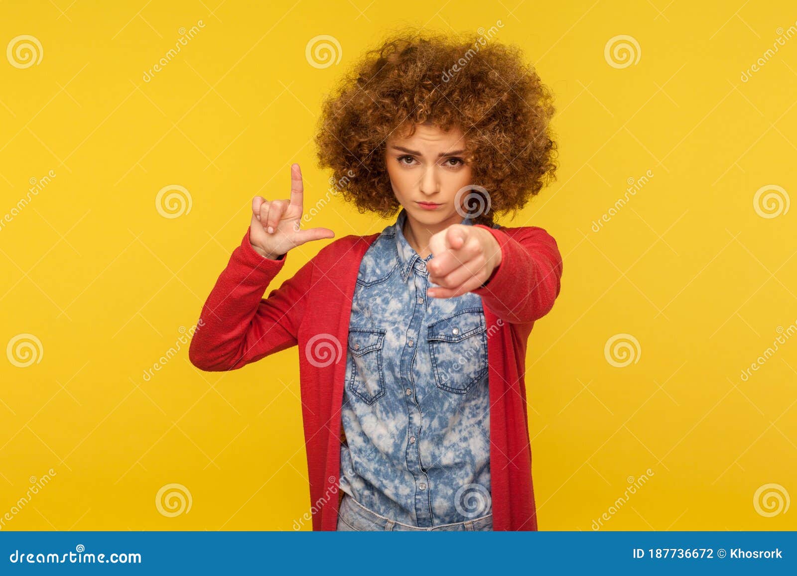Portrait of Curly-haired Woman Expressing Disrespect, Showing L Finger ...