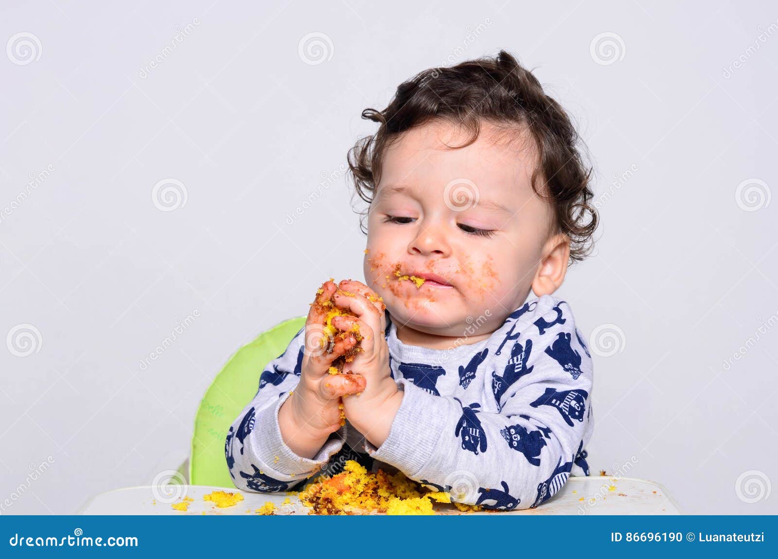 Portrait of a Cute Baby Eating Cake Making a Mess. Stock Photo - Image ...