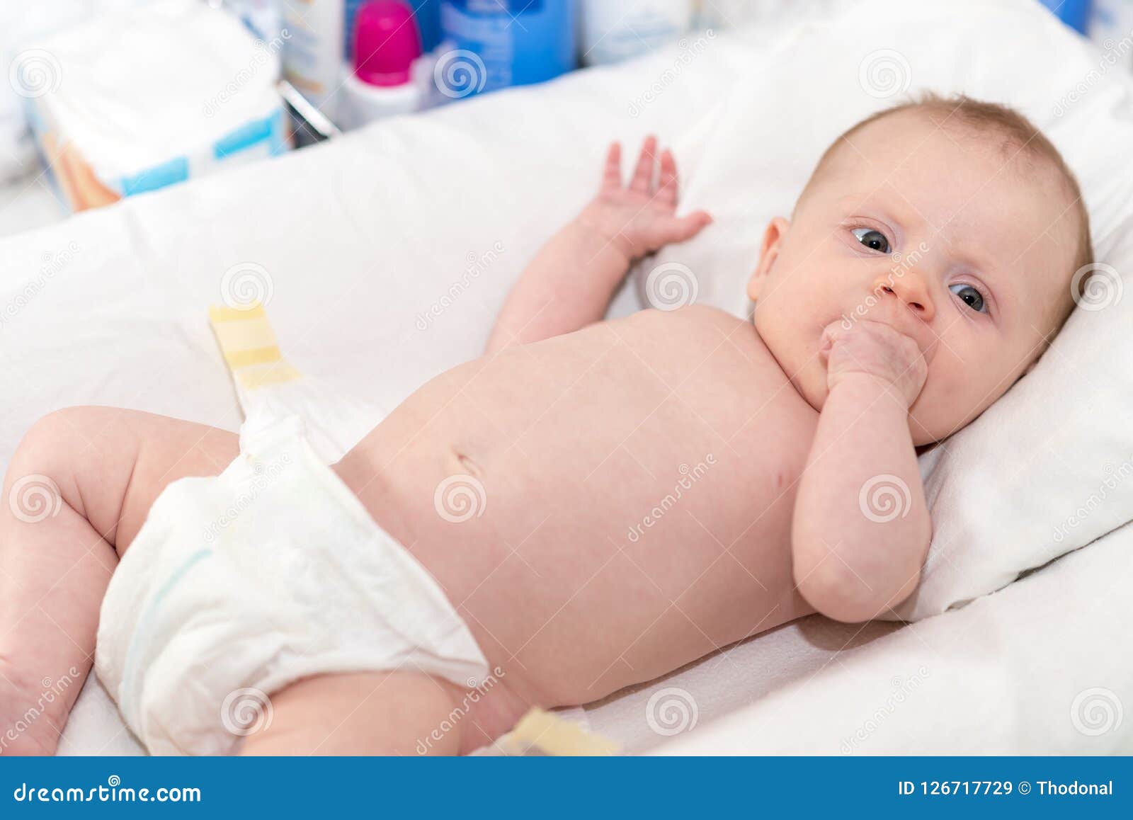 Стоковая фотография 84850726: Cute Baby Girl Wearing Diaper