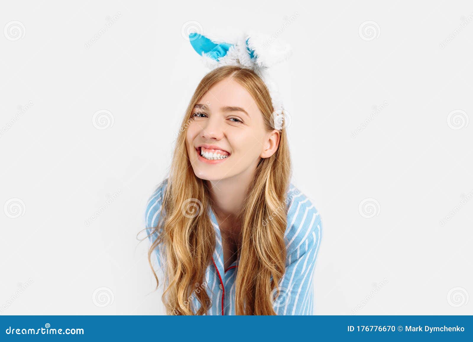 Portrait of a Cute Beautiful Girl in Pajamas, with Bunny Ears on Her ...