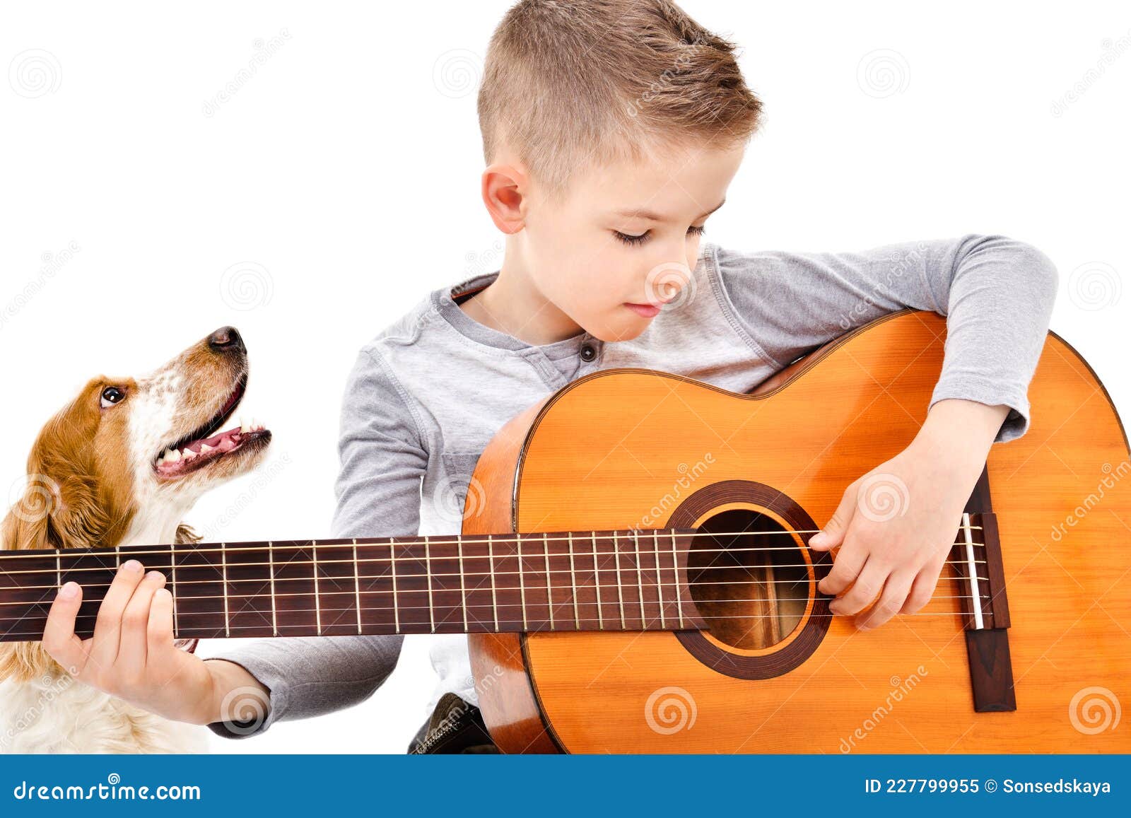 cute boy playing guitar