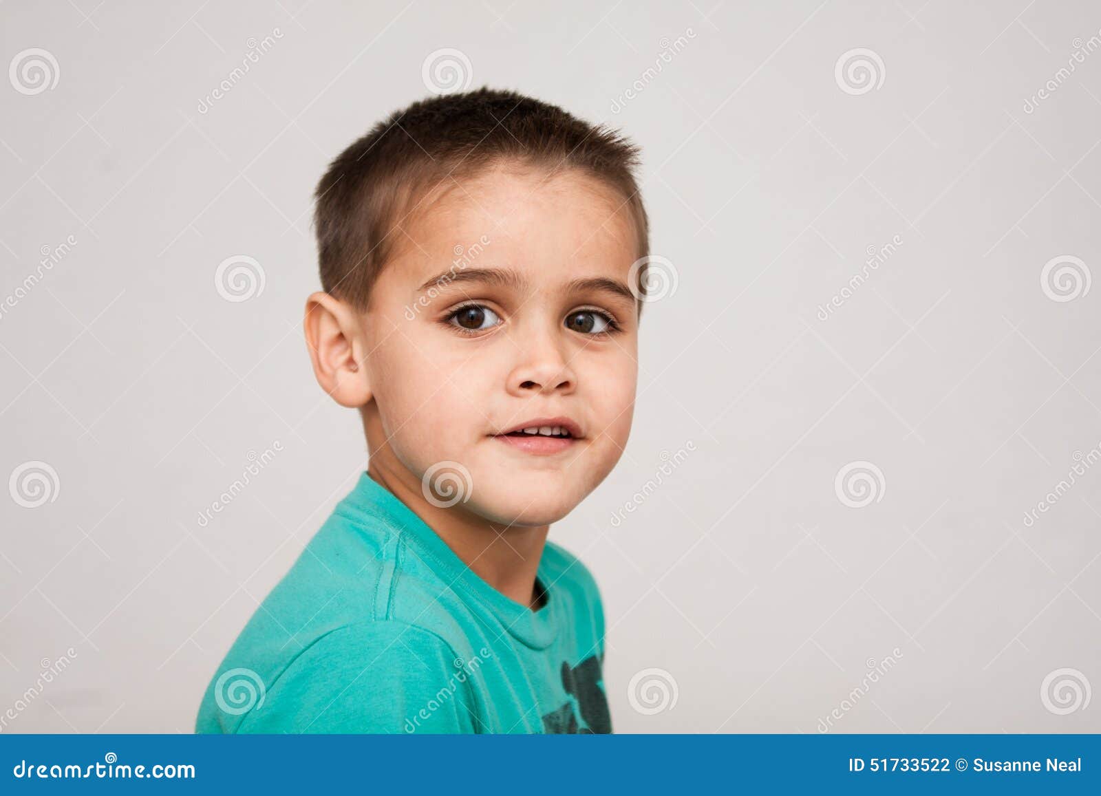 Portrait Of Cute Four Year Old Boy With Short Haircut Stock Photo