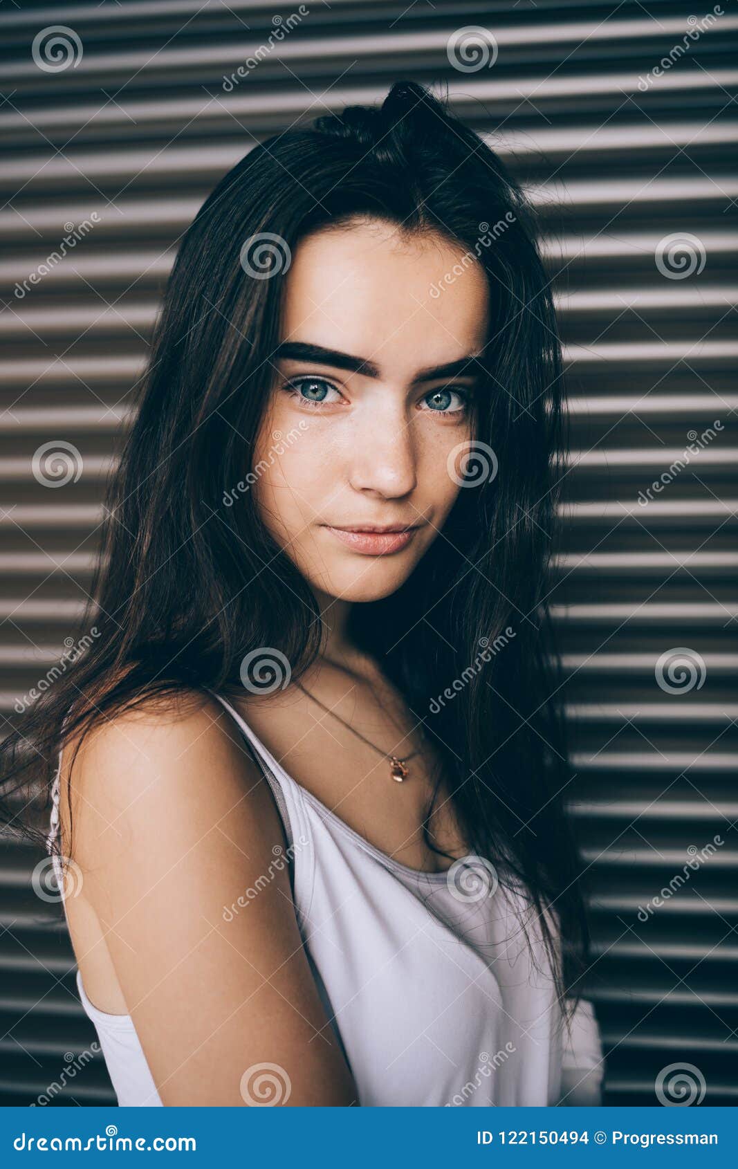 Portrait of Cute Girl with Long Dark Hair and Blue Eyes Stock Photo - Image  of fashionable, candid: 122150494
