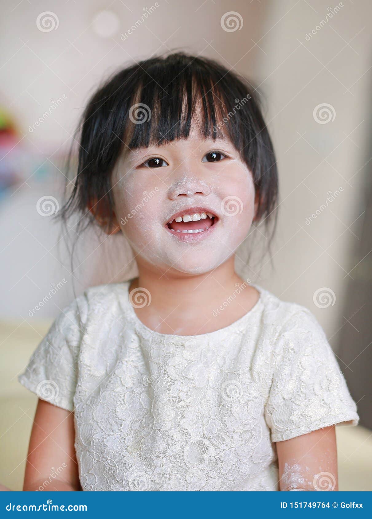 Portrait of Cute Little Smile Girl with Baby Powder on Her Face. Talcum ...