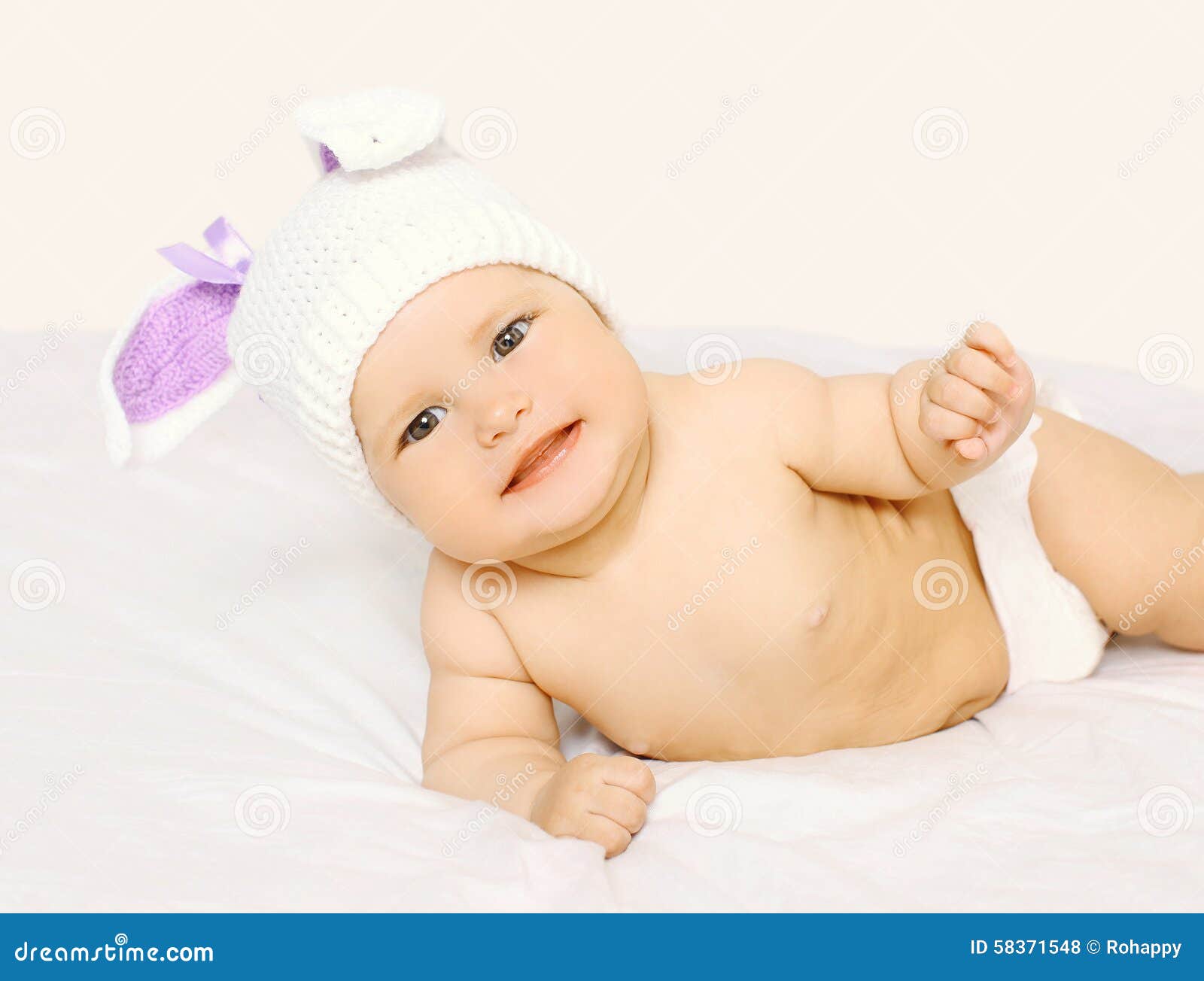 Portrait of Cute Smiling Baby in Hat on the Bed Stock Photo Image of