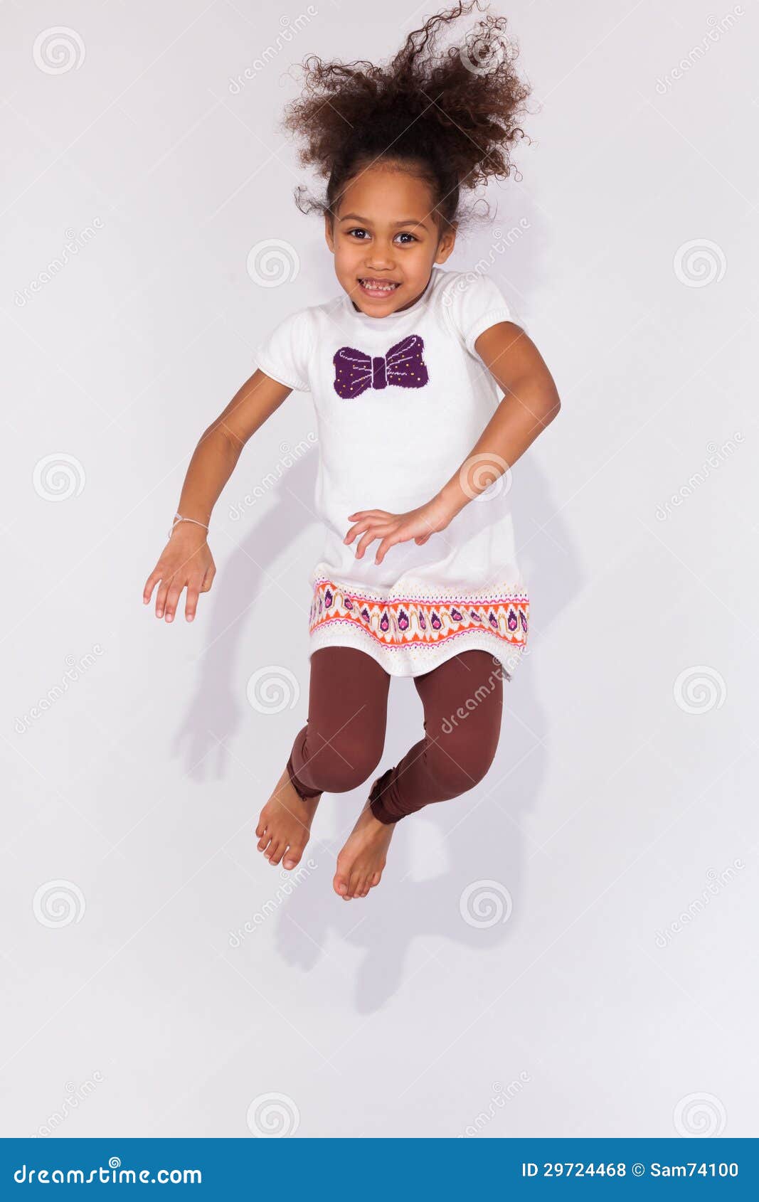 Portrait of Young African American Girl Jumping Stock Photo - Image of ...