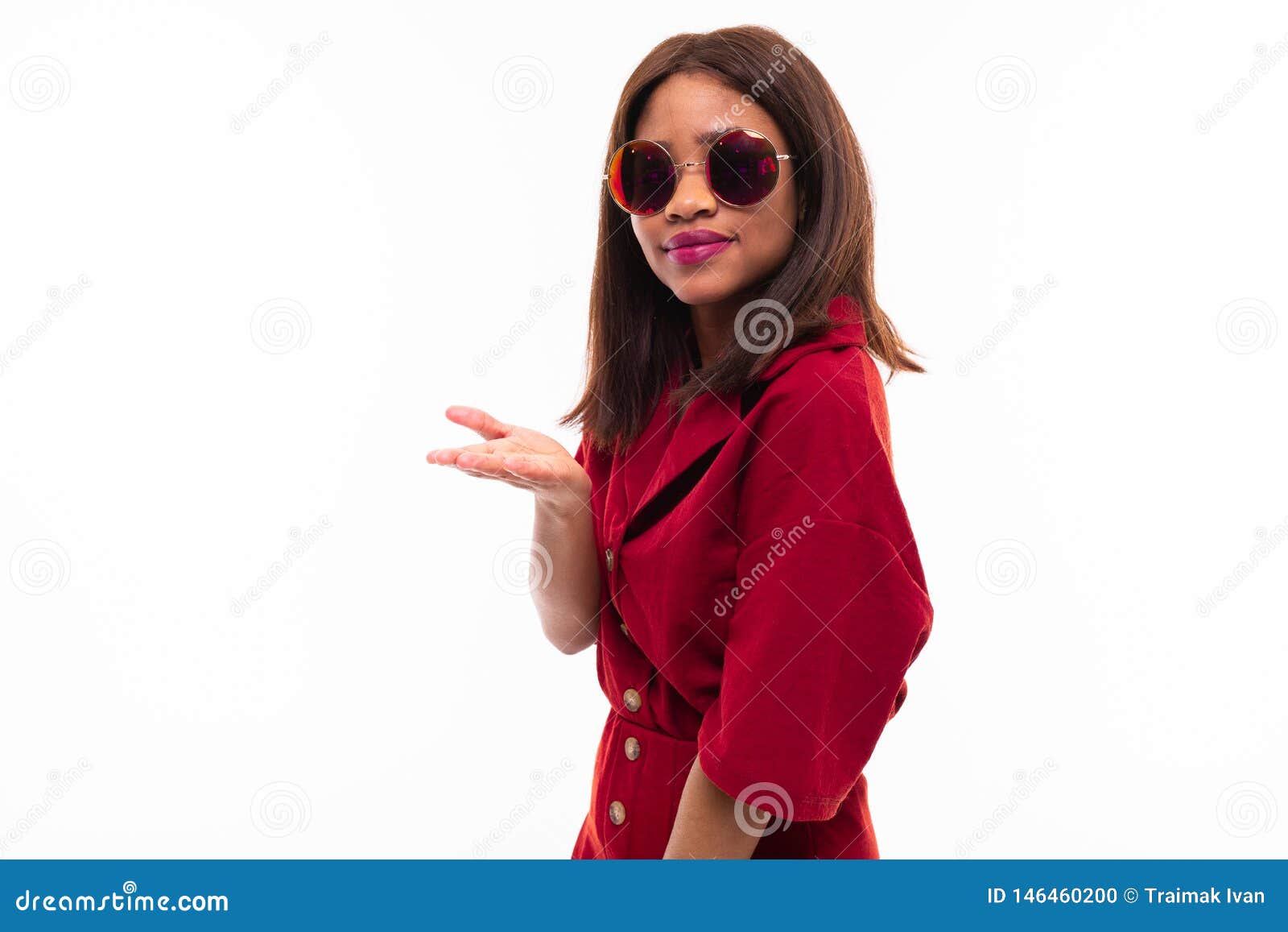 portrait of dark-skinned charming young girl gesticulating her hands