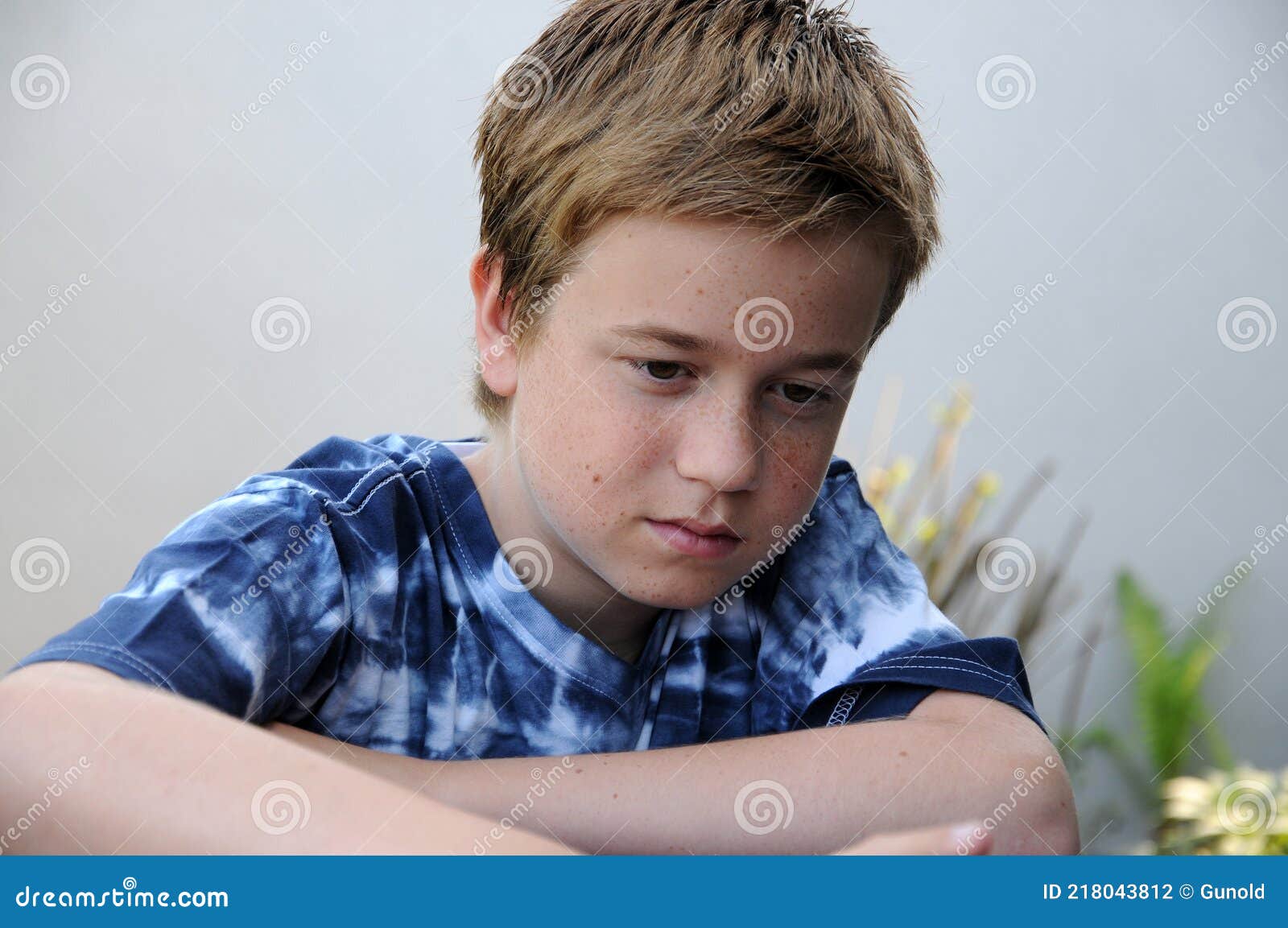 Sad boy feeling all alone stock photo. Image of nerved - 218043812