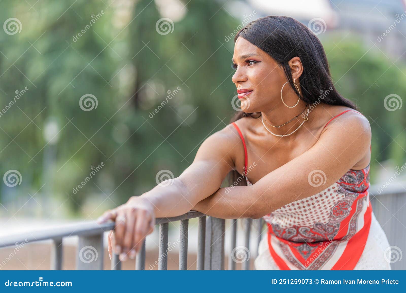 Distracted Transgender Happy Woman in a Park Stock Image - Image