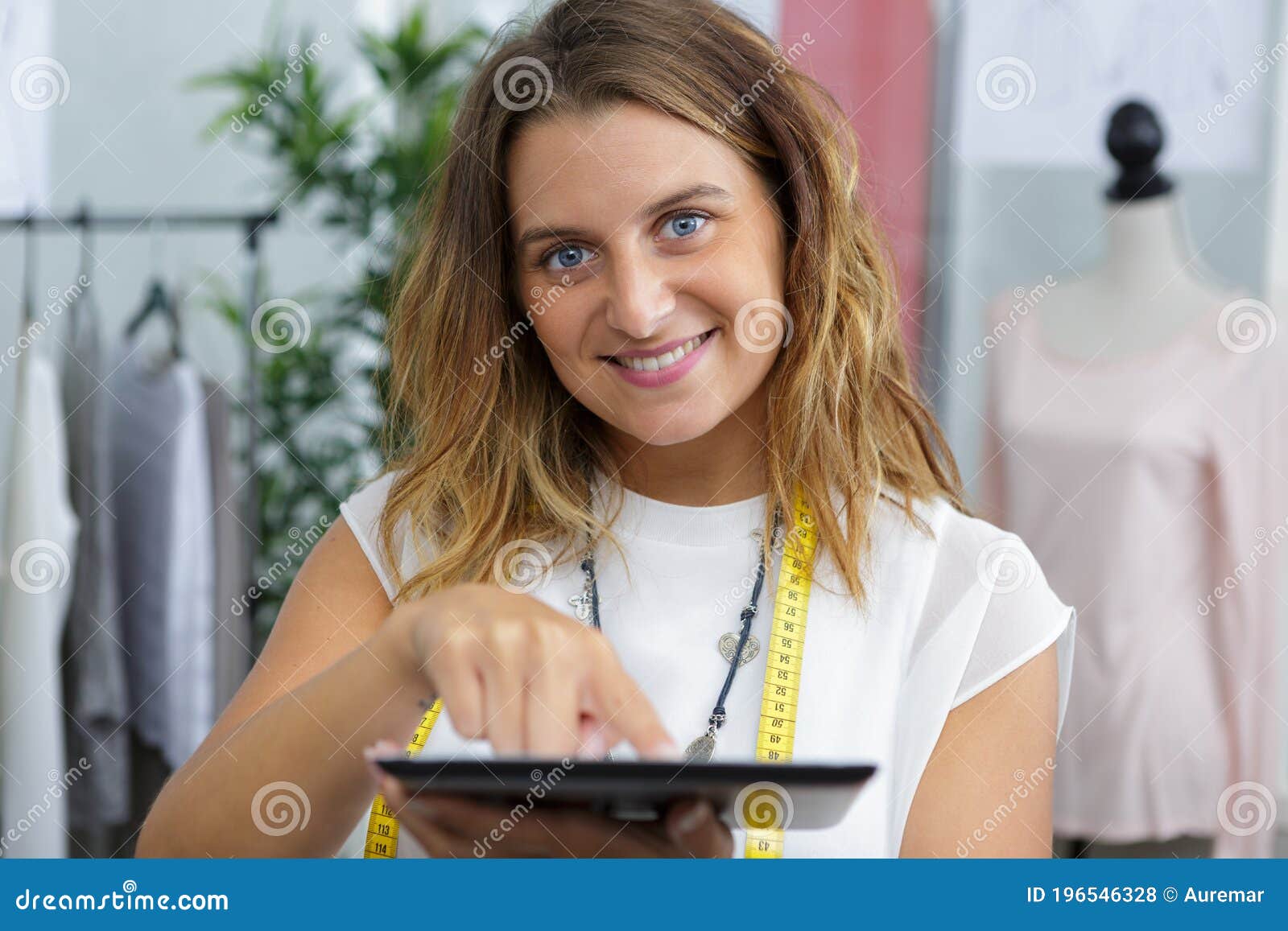 Dressmaker Using Professional Overlock Sewing Machine In