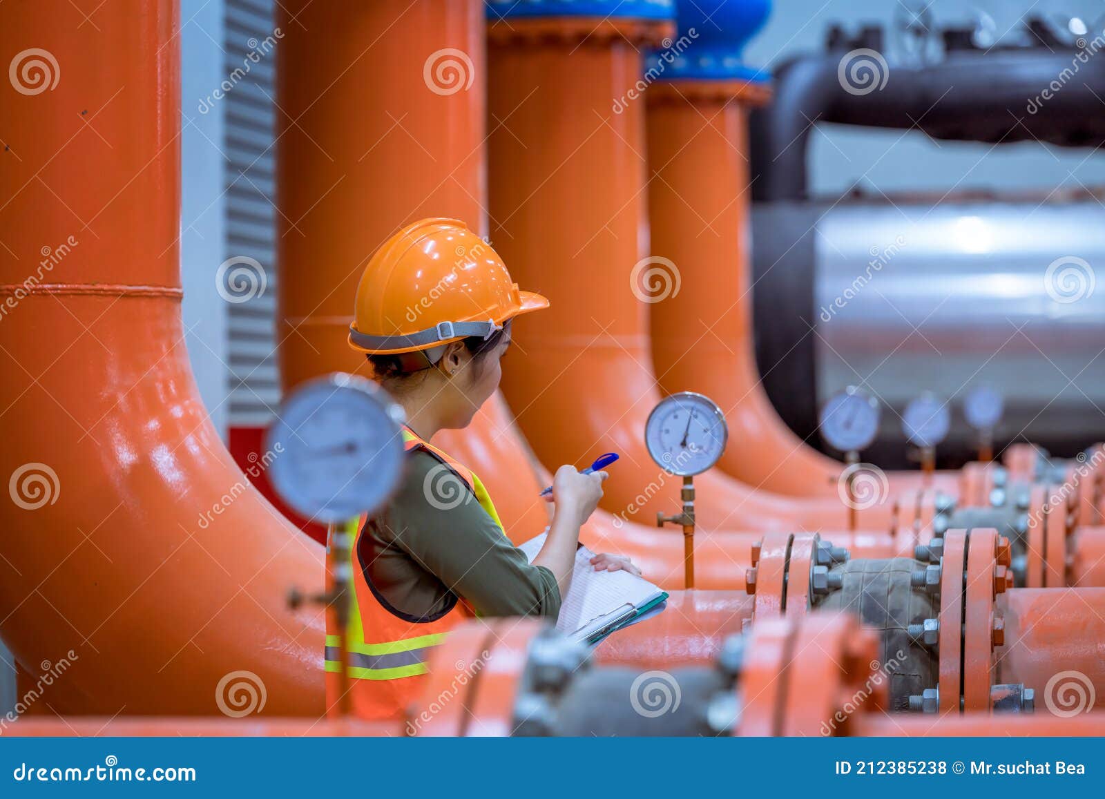 portrait engineer under inspection and checking construction process railway and checking work on railroad station .engineer weari
