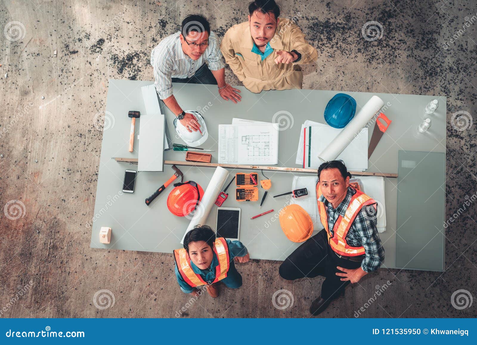 portrait of engineers and architects are site visit and inspection together for their project, unity and teamwork concept