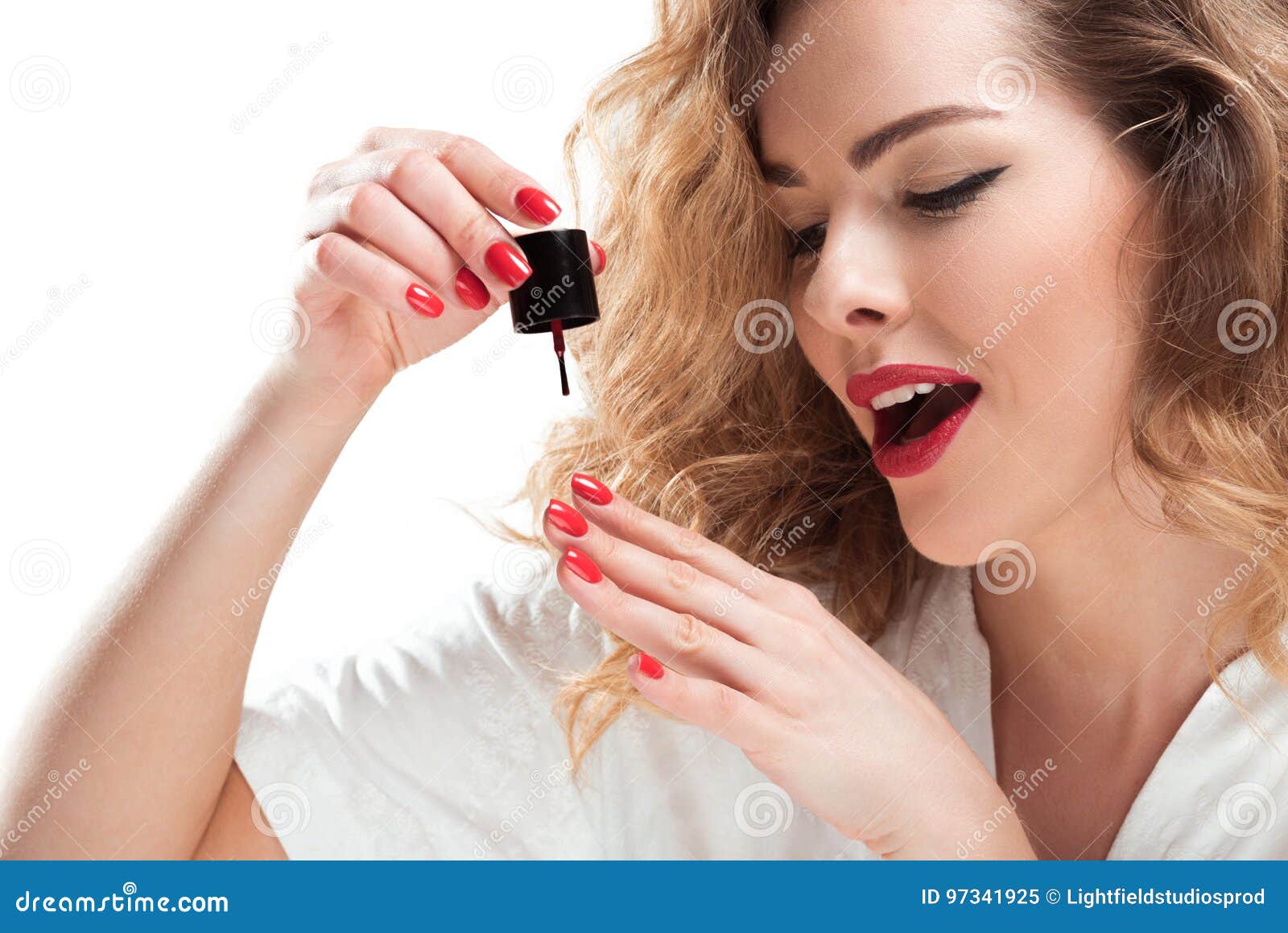 Portrait Of Excited Woman Applying Nail Polish Stock Image Image Of Fashion Alone 97341925