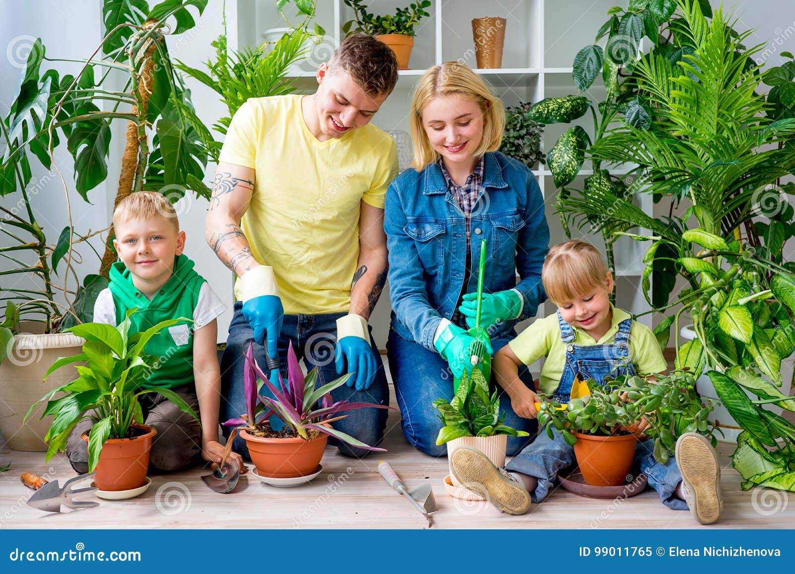 Family gardening together stock image. Image of girl - 99011765