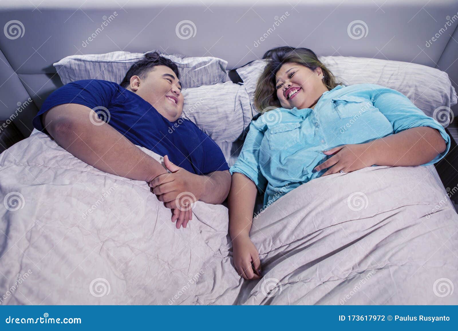 Fat Asian Couple Chatting Before Going To Bed Stock Photo Image Of
