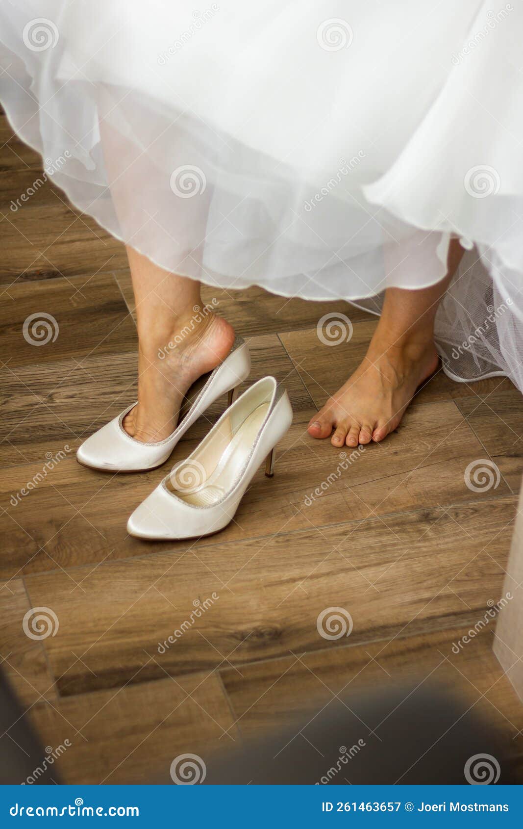 A Portrait of the Feet of a Woman Putting on Her Bridal Shoes in the ...